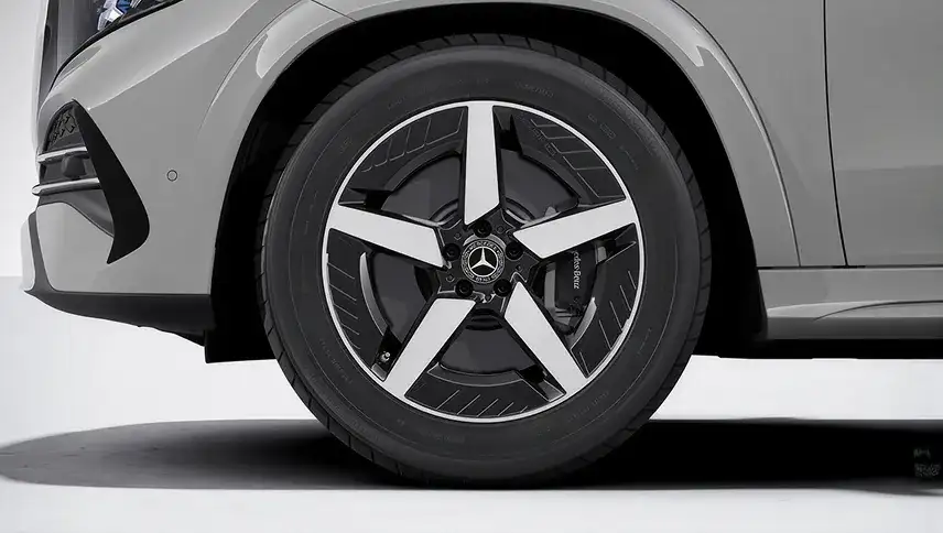 20-inch AMG 5-spoke wheel with black accents on a grey GLE.