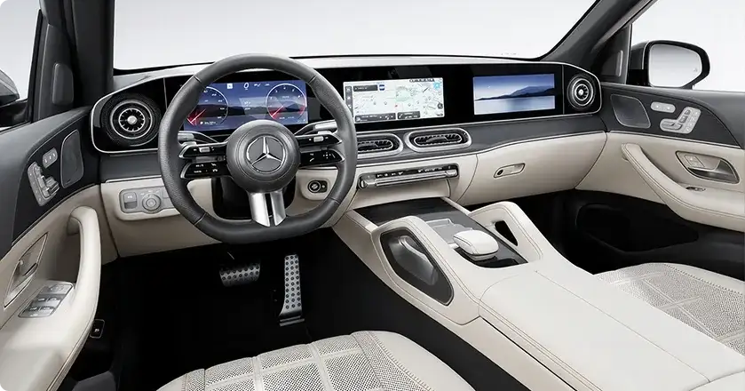 GLE cockpit with the MBUX Superscreen spanning the dashboard behind the steering wheel.