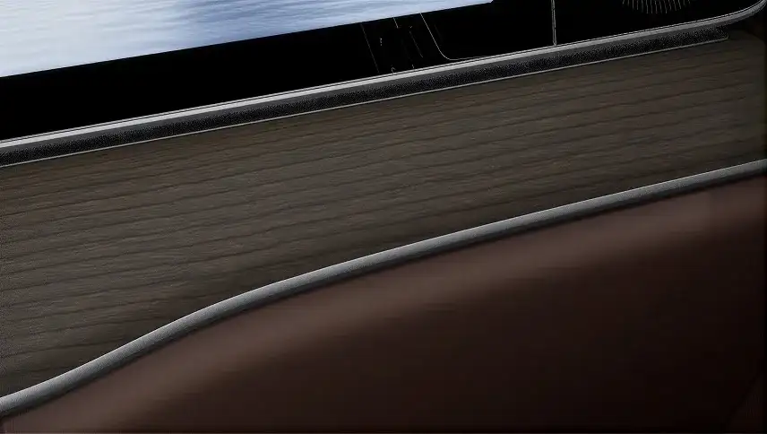 Natural Grain Dark Brown Birch wood trim running along the GLE door panel.