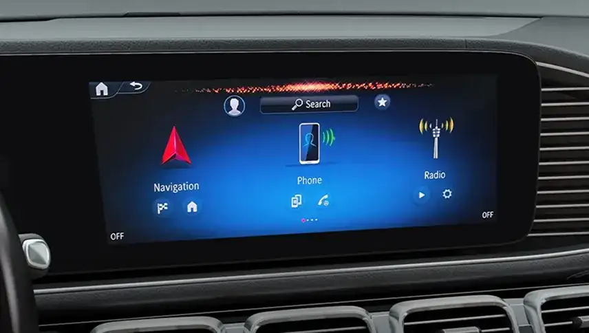 Central touchscreen showing the Navigation, Phone and Radio tiles.