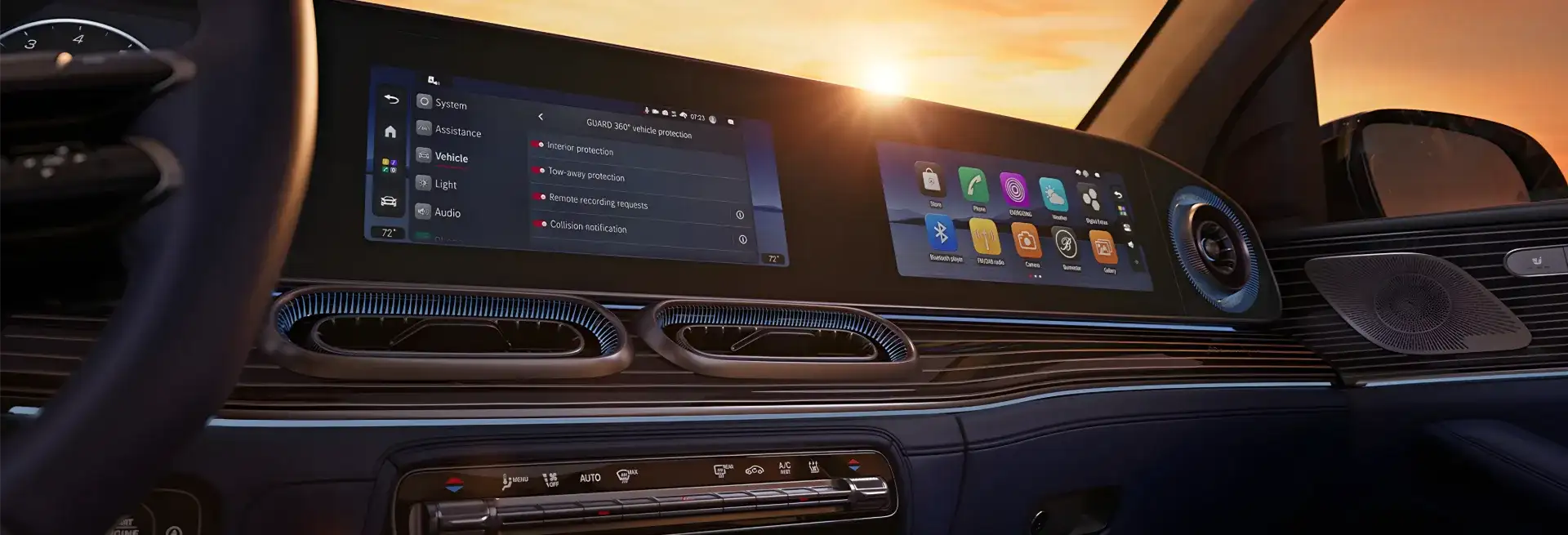 GLE cockpit at sunset with the MBUX displays glowing across the dashboard.