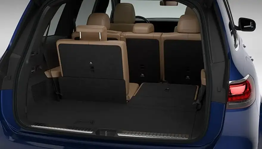 Blue GLS cargo area with the third-row seatbacks partly raised