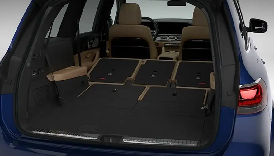 Blue GLS with the second- and third-row seats folded into a flat cargo floor