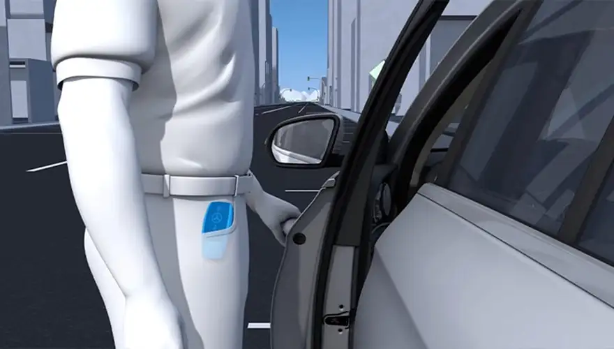 Illustration of a driver reaching for the door handle with the key still pocketed