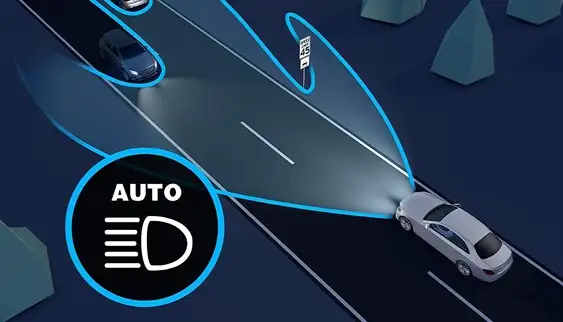 Night illustration of headlamp beams dimming around an oncoming car