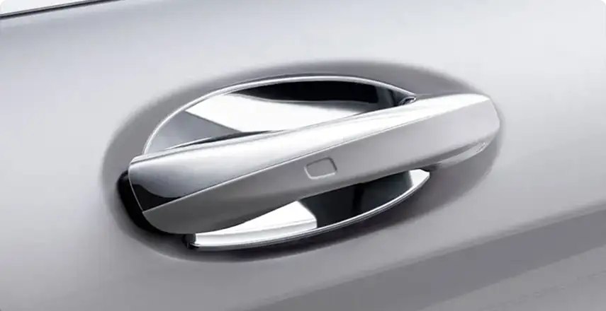 Chrome insert fitted to the door handle of a silver Mercedes-Benz