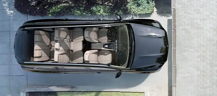 Overhead view of the GLS cabin showing all three rows of beige leather seats