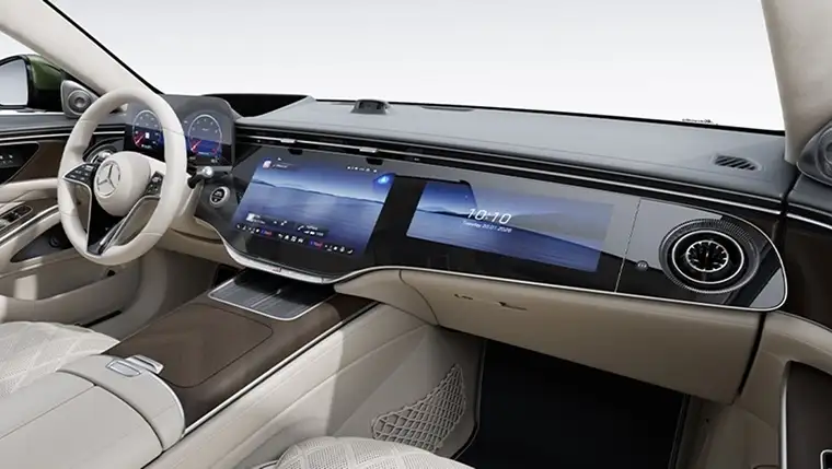 Cream dashboard with the driver display, central touchscreen and passenger screen