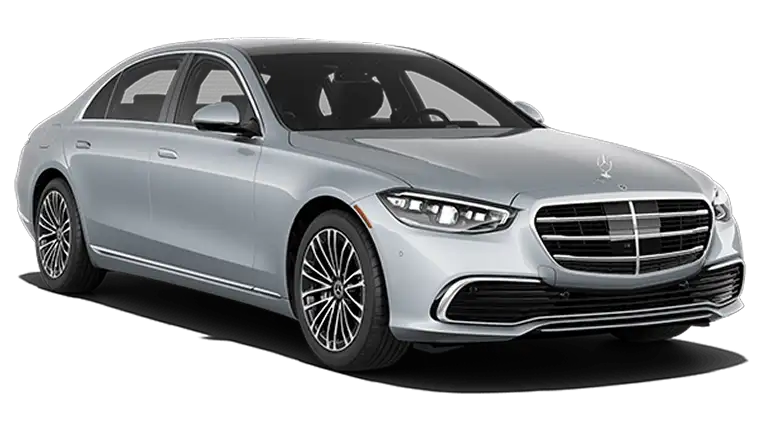 Silver Mercedes-Benz S 580 4MATIC Sedan shown from a front three-quarter angle on a black background