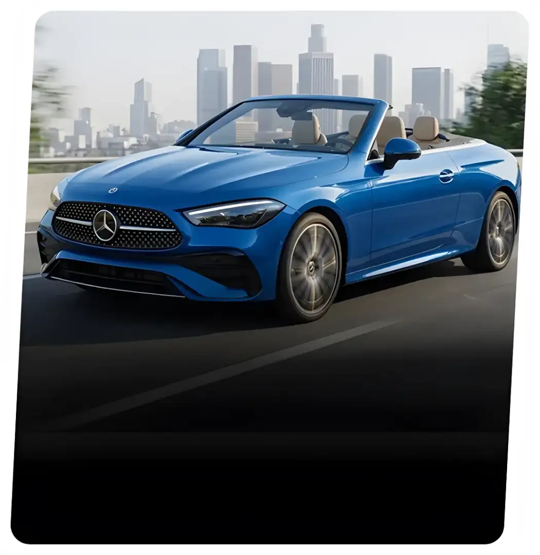 Mercedes-Benz convertible with the roof lowered.