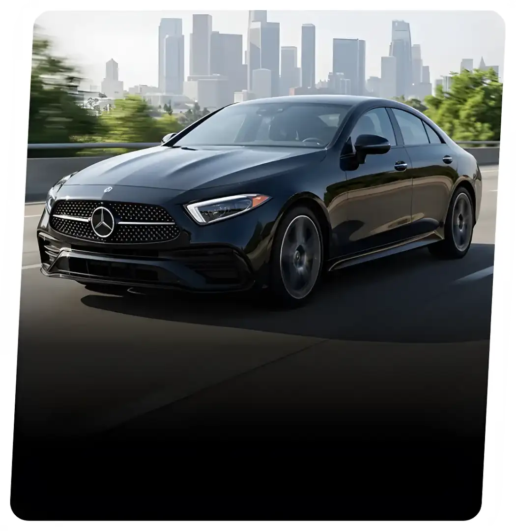 Mercedes-Benz coupe photographed on the road.