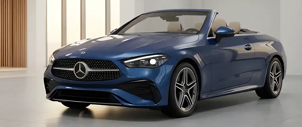 Blue Mercedes-Benz convertible with the soft top lowered, in a light-filled showroom.