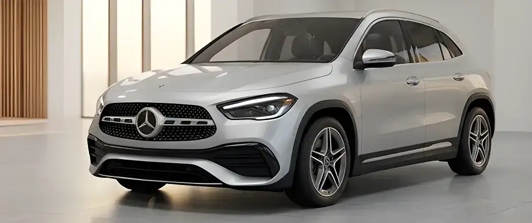Silver Mercedes-Benz SUV in a light-filled showroom.