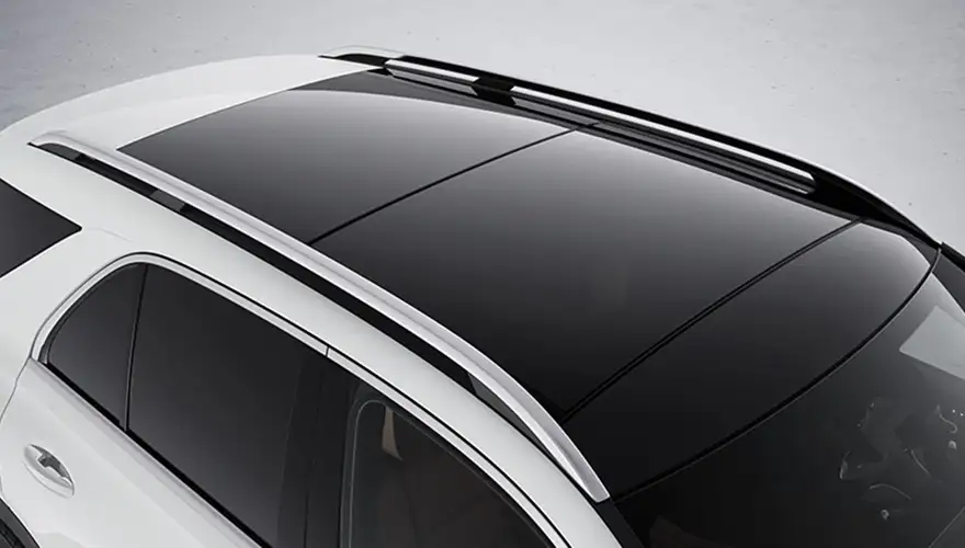 Silver aluminum roof rails beside the black glass roof of a white GLE