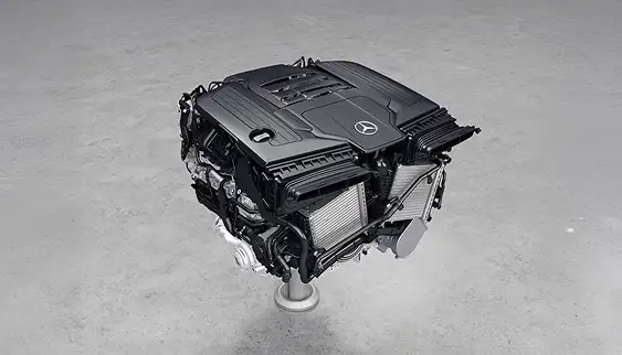 Inline-4 turbo engine on a stand in a white studio