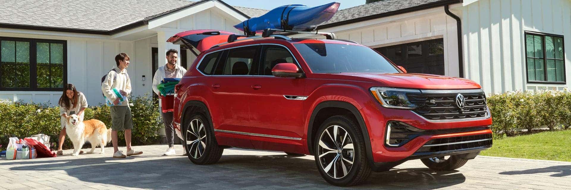 family around volkswagen atlas