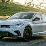 White 2026 Volkswagen Jetta GLI driving on street