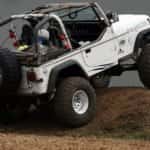 Jeep Jumping a Hill