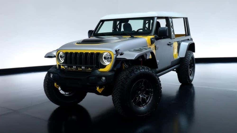 Silver and yellow Jeep Wrangler 4xe Rubicon 2025