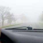Car driving in the fog
