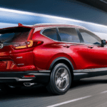 Radiant Red Metallic 2020 CR-V taking a turn