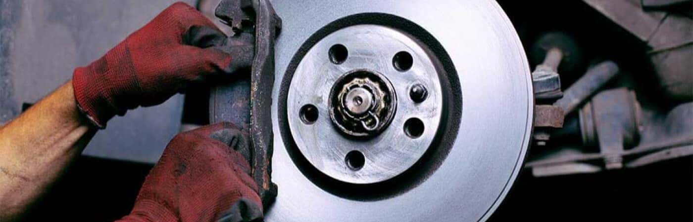 Mechanic working on Brakes