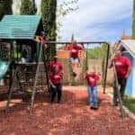 KG Employees on swingset