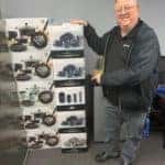 KG employee with boxes of kitchen supply