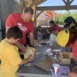 People building birdhouses