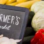 Fresh produce with a farmer's market sign