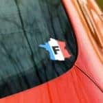 France sticker on back of red car window