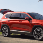 2020 Hyundai Santa Fe with family storing bicycles in trunk