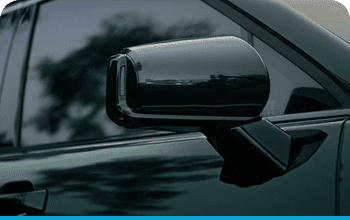 Power-folding outside mirrors
