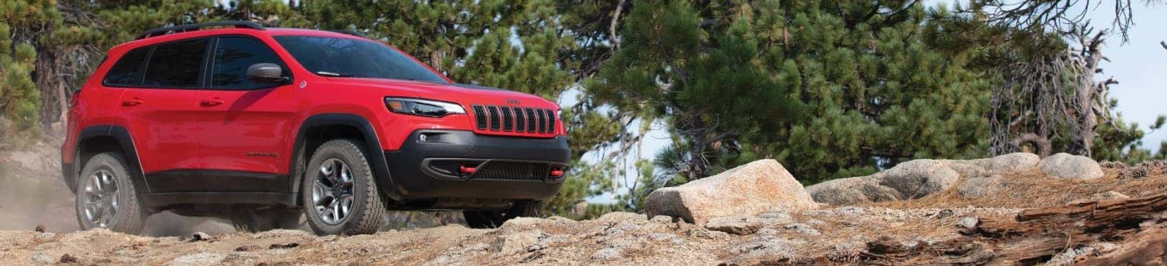 2021 Jeep Cherokee Trailhawk red on mountaintop banner