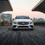 White 2019 Mercedes-Benz C-Class on Wooden Platform in City