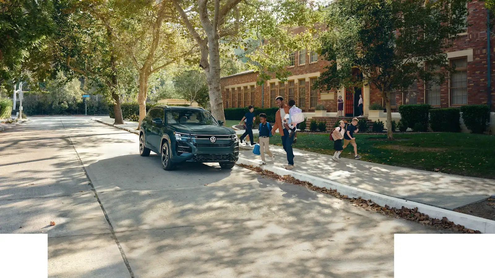 2027 VW Atlas Three-Row SUV parked at school pickup in Lexington, SC