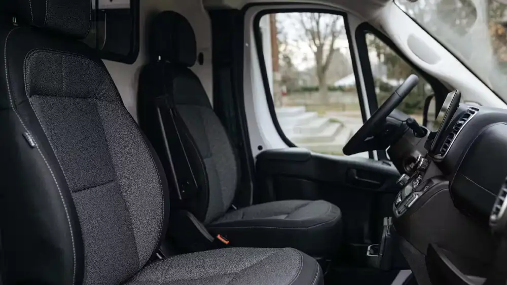 2026 Ram ProMaster EV interior with digital cluster and cargo bay