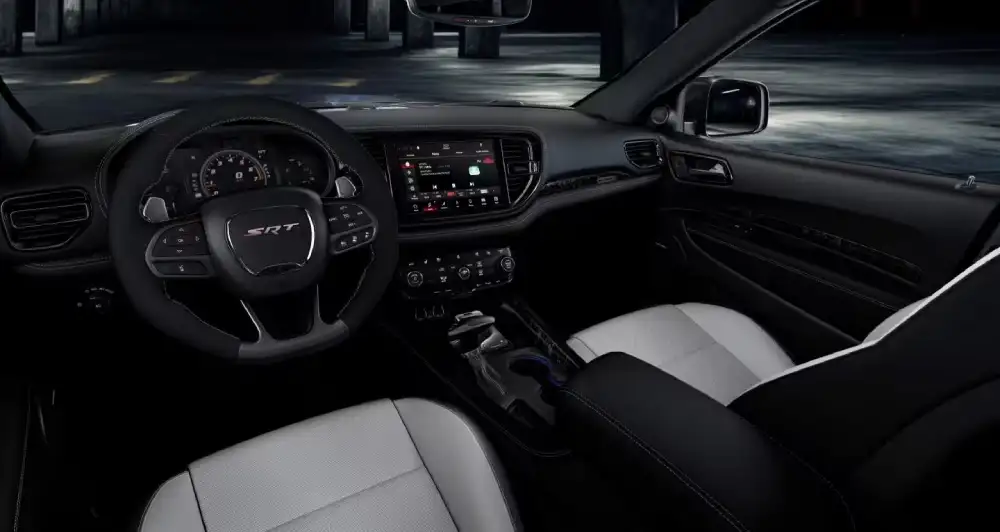 2026 Dodge Durango interior with three-row seating and Uconnect touchscreen