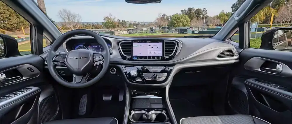 2027 Chrysler Pacifica interior with Uconnect touchscreen and Stow 'n Go seating