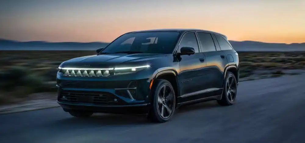 2026 Jeep Wagoneer S exterior with illuminated grille and R-Wing spoiler