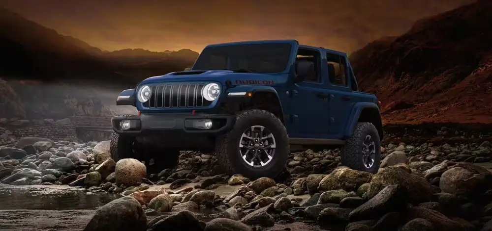 2026 Jeep Wrangler exterior with seven-slot grille and removable doors