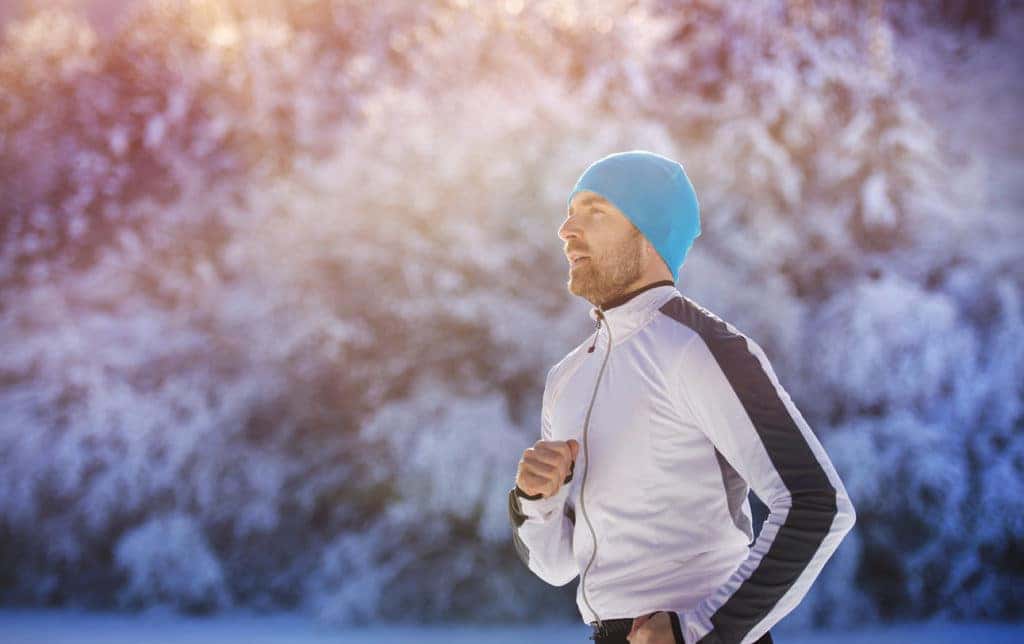 Man running outside in winter