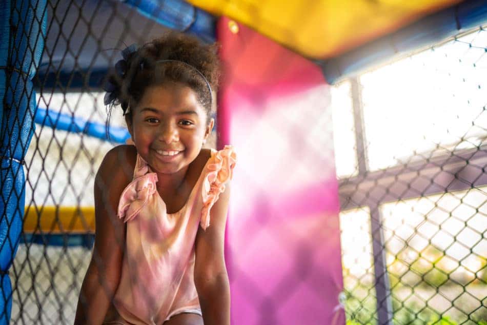 Little girl playing in an indoor playground