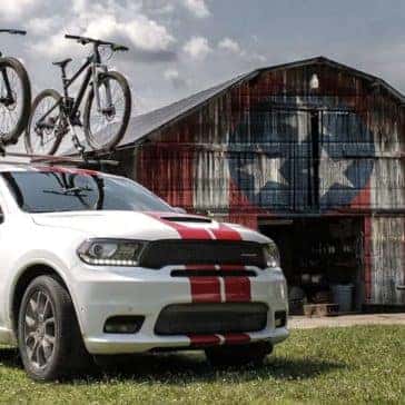 2019 Dodge Durango parked in front of shed