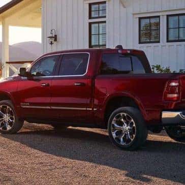 2019 Ram 1500 parked next to home