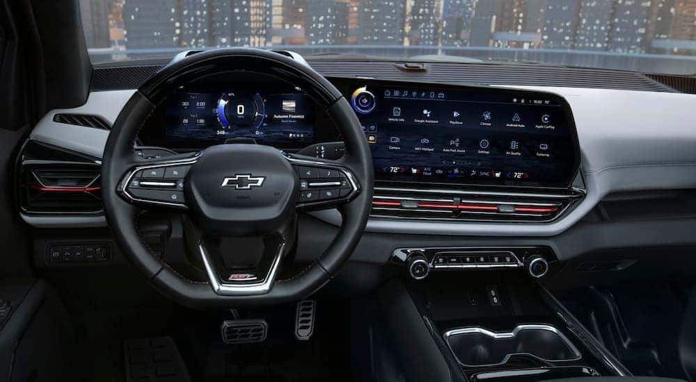 The black interior of 2025 Chevy Silverado EV for sale is shown.