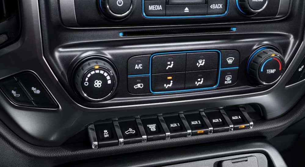 The center console dash controls are shown in a 2025 Chevy Silverado 4500 HD.