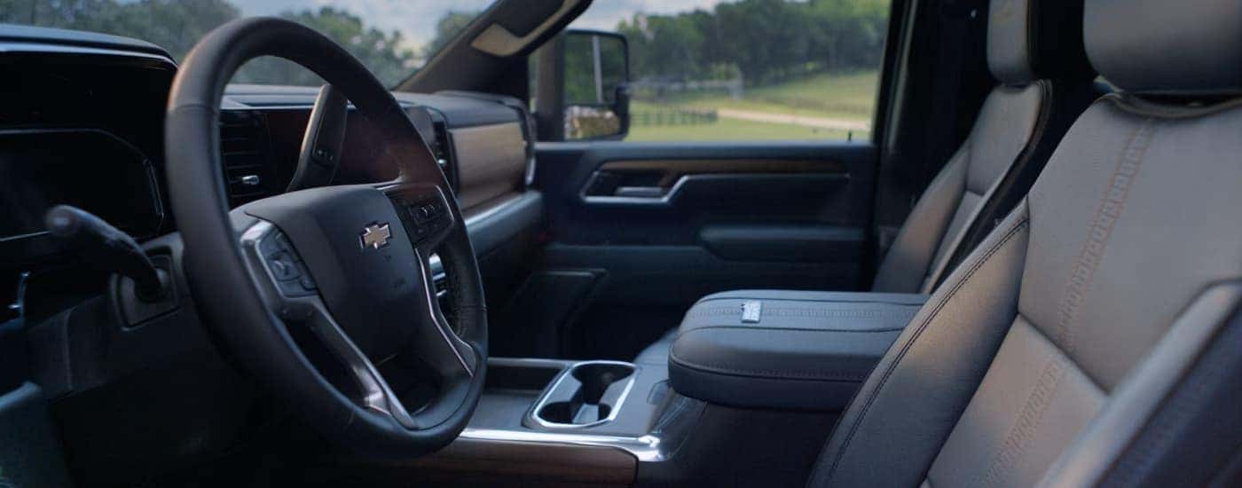 Dark gray leather interior of a 2025 Chevy Silverado 3500 for sale near Midlothian