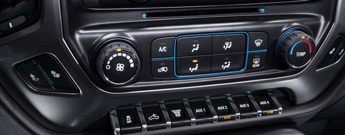 Close-up of center gauges and buttons in a 2025 Chevy Silverado 4500 for sale near Midlothian.