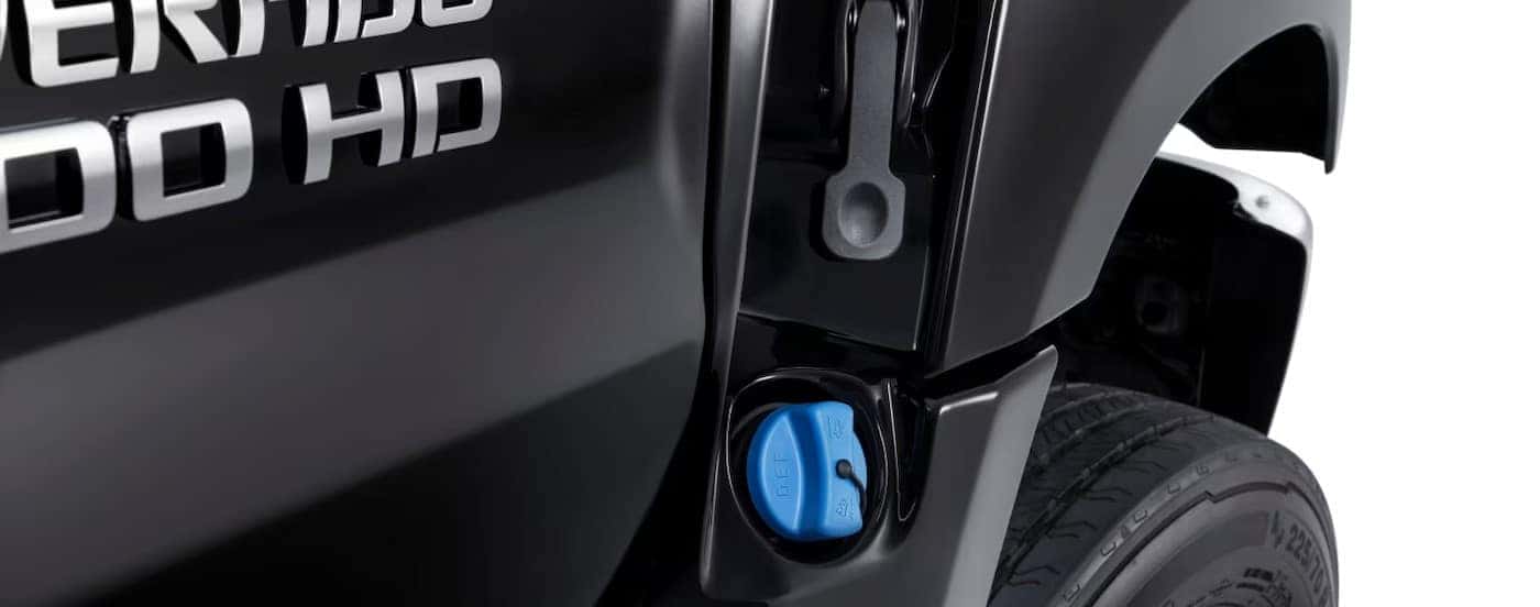 Close-up of the diesel exhaust fluid cap on a black 2025 Chevy Silverado 4500.